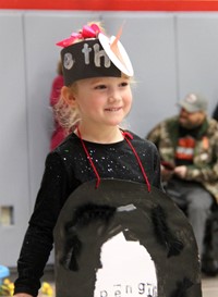 student smiling in penguin parade