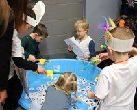 students playing fishing game