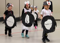 students in penguin parade