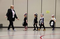 students and teacher in penguin parade