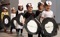 multiple students in penguin parade