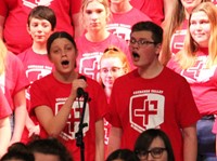 two students singing