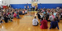 wide shot of show of love assembly