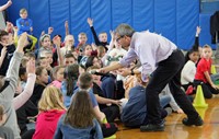 student in audience answering question 