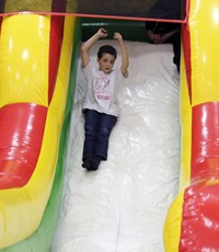 student going down slide