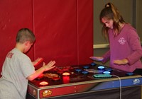 two students playing community night game
