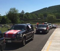 vehicles lined up at Port Dickinson Elementary