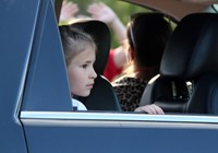 student in car