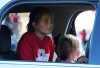 students in car