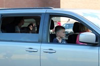 family in car