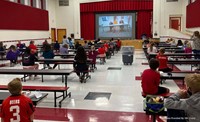 students watching live stream of Dr. Gill and honorees/representatives