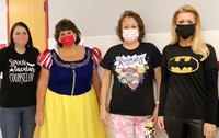 faculty and staff dressed up for Halloween