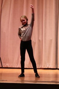 student performing at talent show