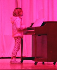 student performing at talent show