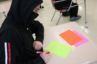 high school student writing letter for great kindness challenge