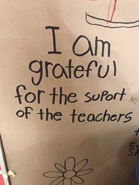 positive message on door about gratitude