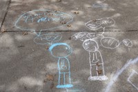 sidewalk chalk drawing about making friends