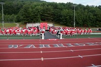 wide shot of student speaking at podium