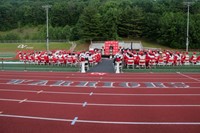 wide shot of superintendent speaking at ceremony