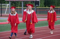 students walking into ceremony