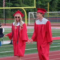 students walking into ceremony