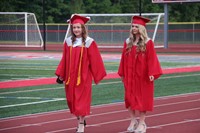 students walking into ceremony