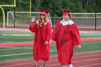 students walking into ceremony