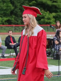 students walking into ceremony