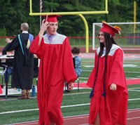 students walking into ceremony