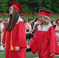 students walking into ceremony