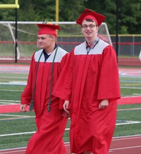 students walking into ceremony