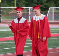 students walking into ceremony