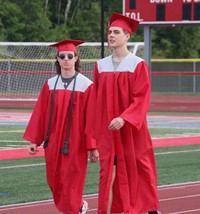 students walking into ceremony