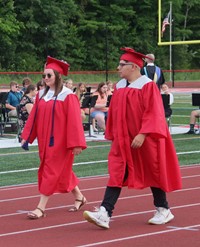 students walking into ceremony