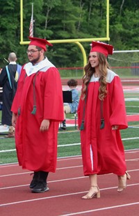 students walking into ceremony