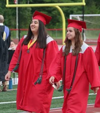 students walking into ceremony