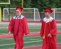 students walking into ceremony