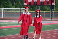 students walking into ceremony