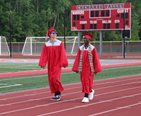 students walking into ceremony