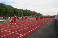 students walking into ceremony