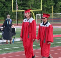 students walking into ceremony