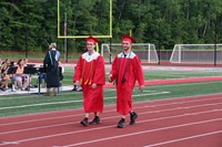 students walking into ceremony