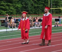 students walking into ceremony