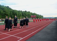 students walking into ceremony