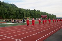 students walking into ceremony