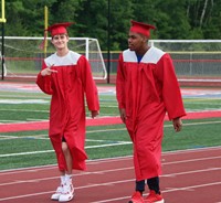 students walking into ceremony