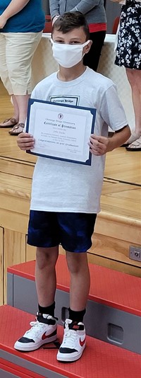 student at fifth grade ceremony