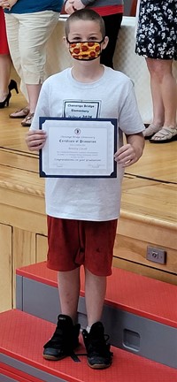 student at fifth grade ceremony