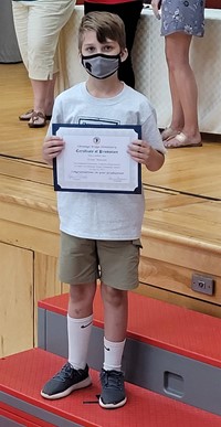 student at fifth grade ceremony