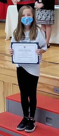 student at fifth grade ceremony